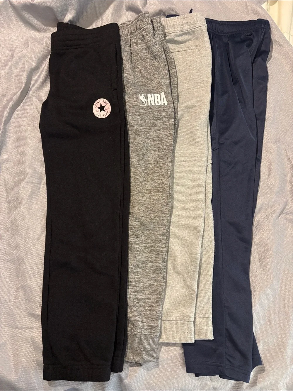 Four pairs of boys joggers size 8